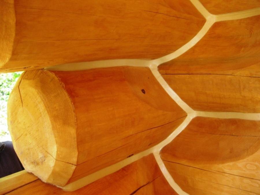 Конопатка сруба бани или дома из бревна: заделка швов джутом, мхом или паклей